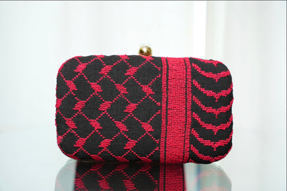 Hand Stitched Kufiya clutch - red on black